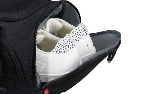 Bolsillo lateral para zapatos